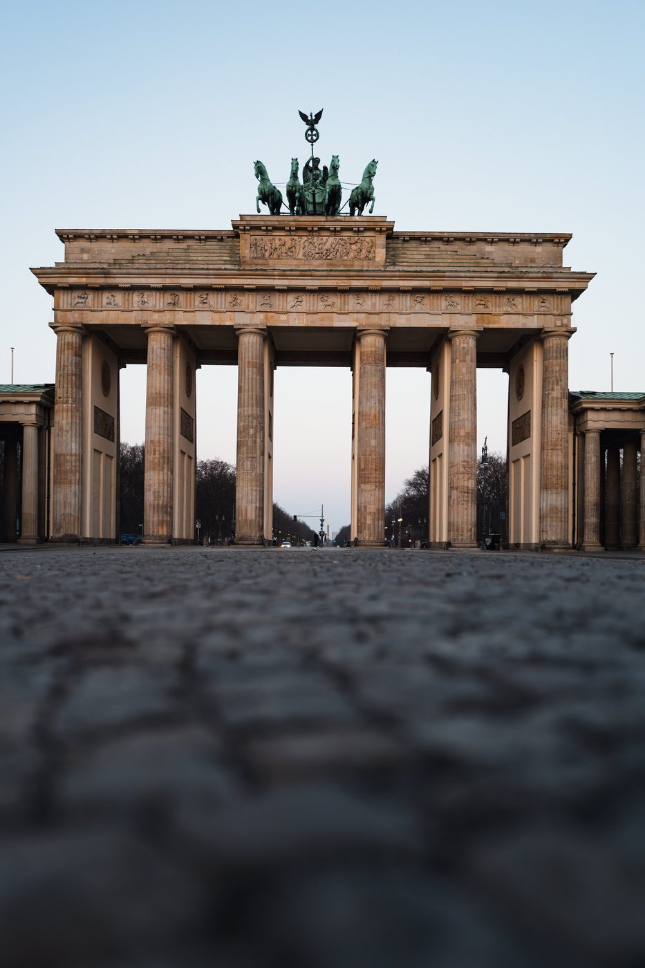Brandenburg Gate seen from a low angle from the cobblestones, Berlin