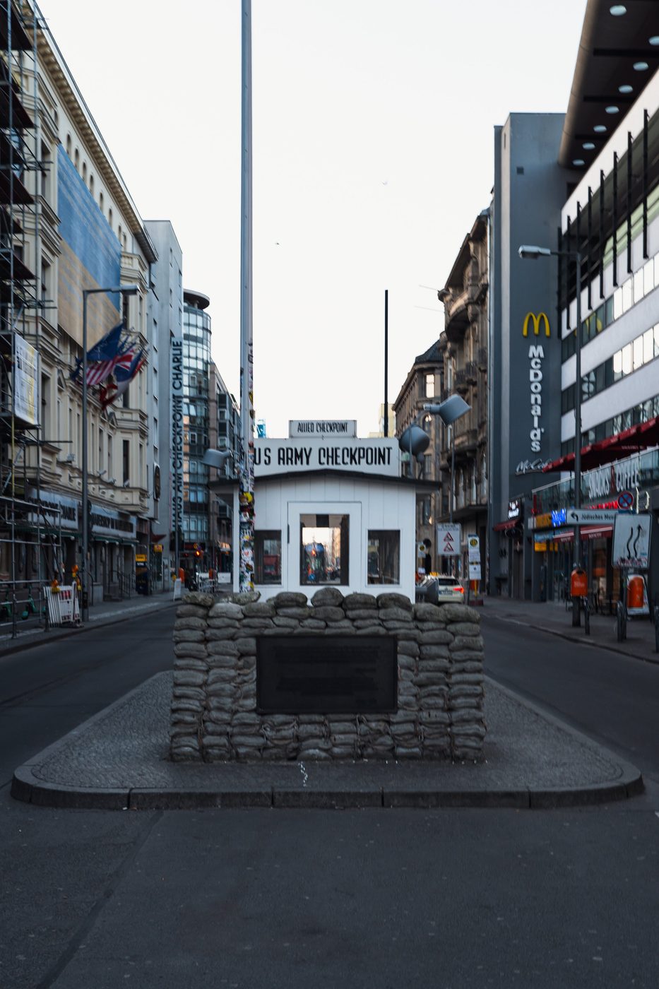 White guardhouse and sandbags at the historic Checkpoint Charlie post, Berlin