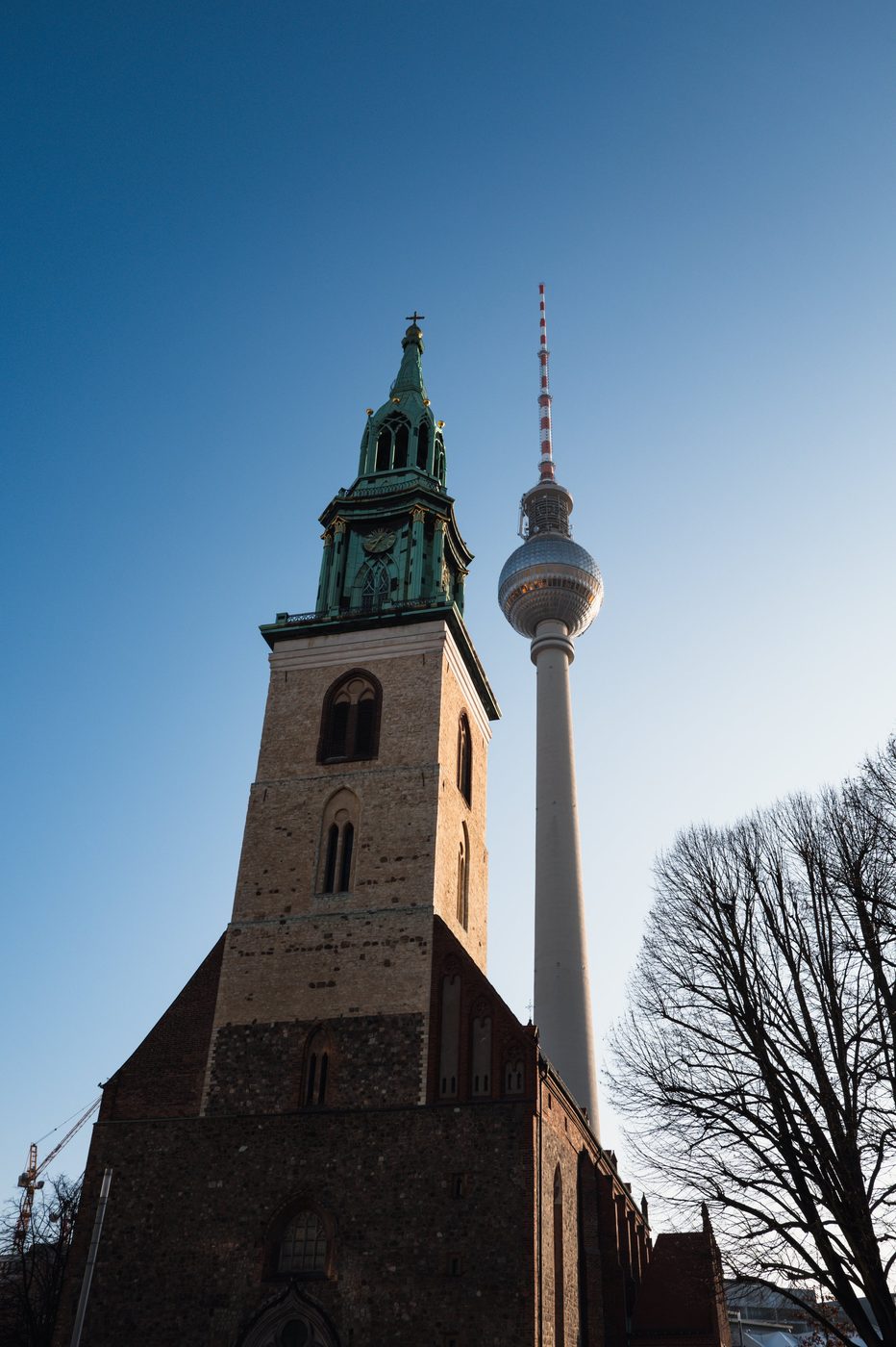 Bell tower of St. Mary's Church standing beside the television tower, Berlin