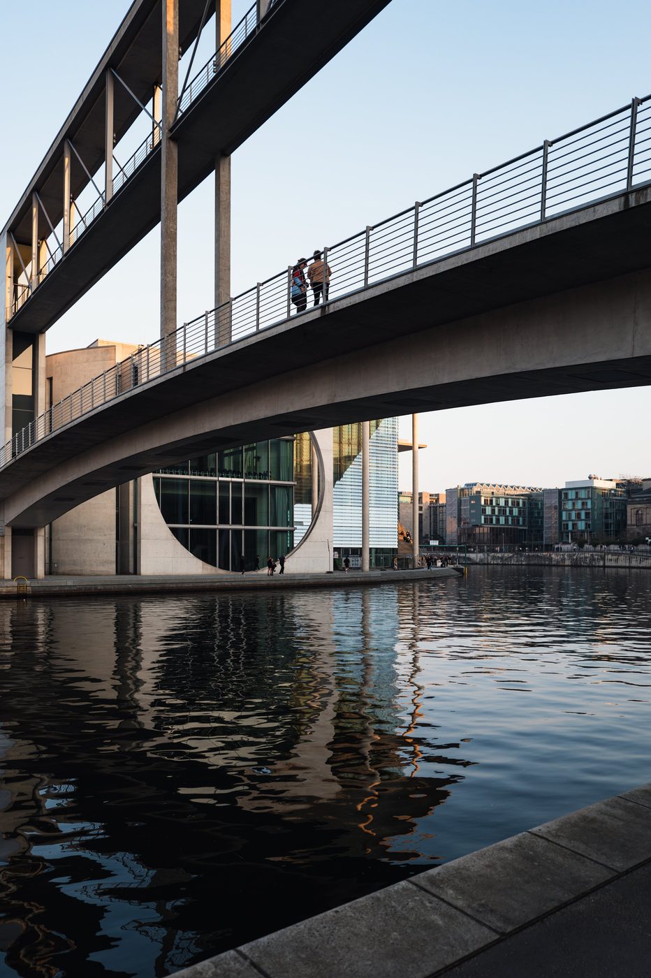 Curved footbridge connecting two Bundestag buildings above the Spree, Berlin