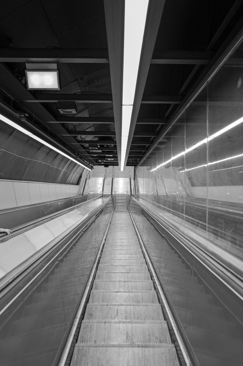 Downward view of an empty metro escalator, Budapest