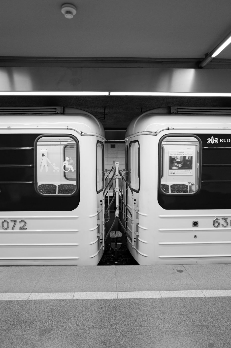 Two twin metro trains nose to nose on the platform, Budapest