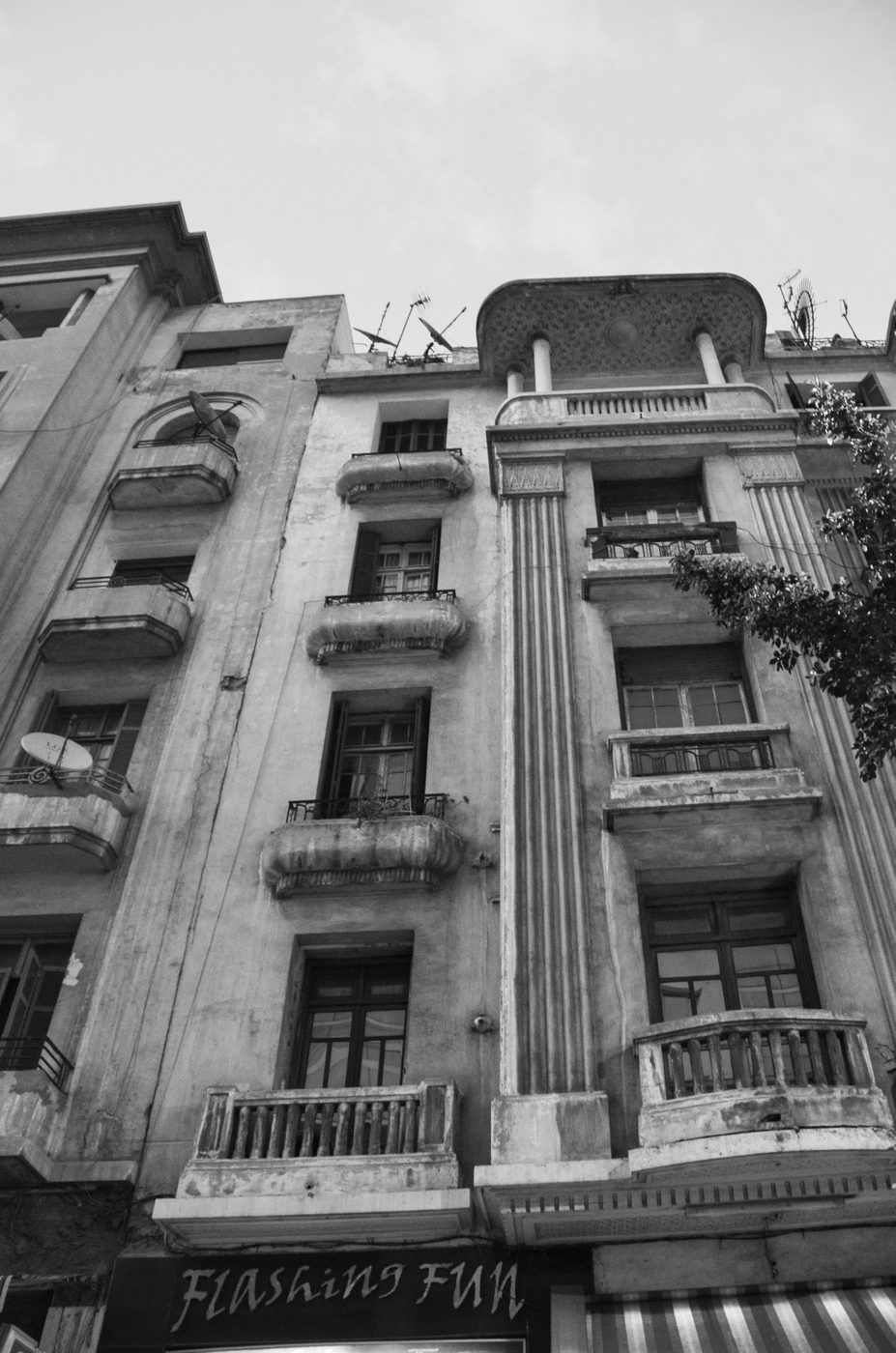 Stacked round balconies on a crumbling downtown facade, Casablanca