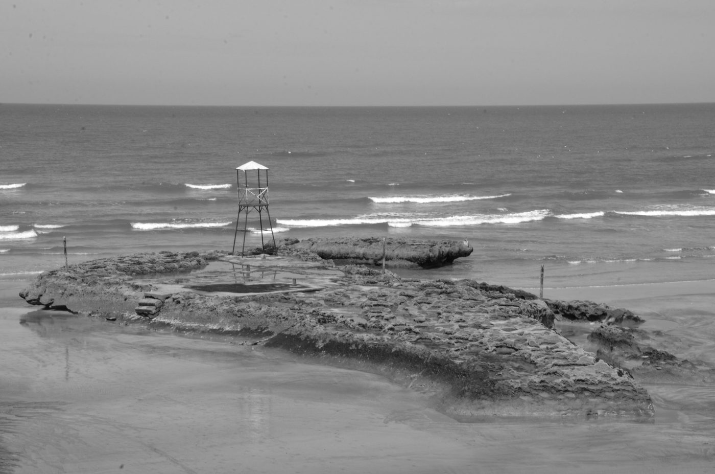 Watchtower perched on a rock facing the waves, Casablanca