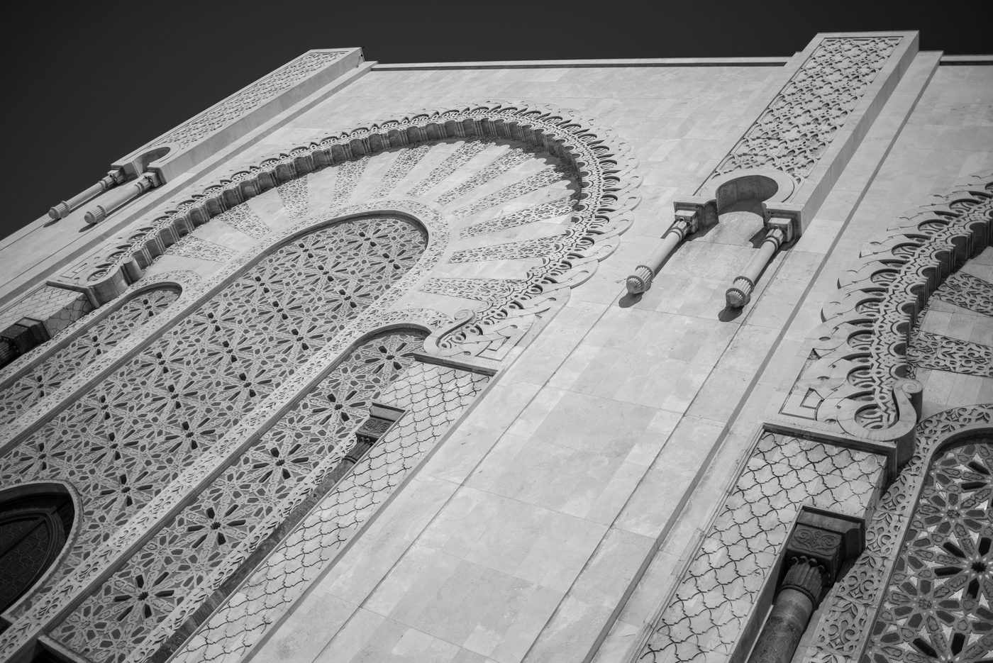 Finely carved stone rosette on the mosque's facade, Casablanca