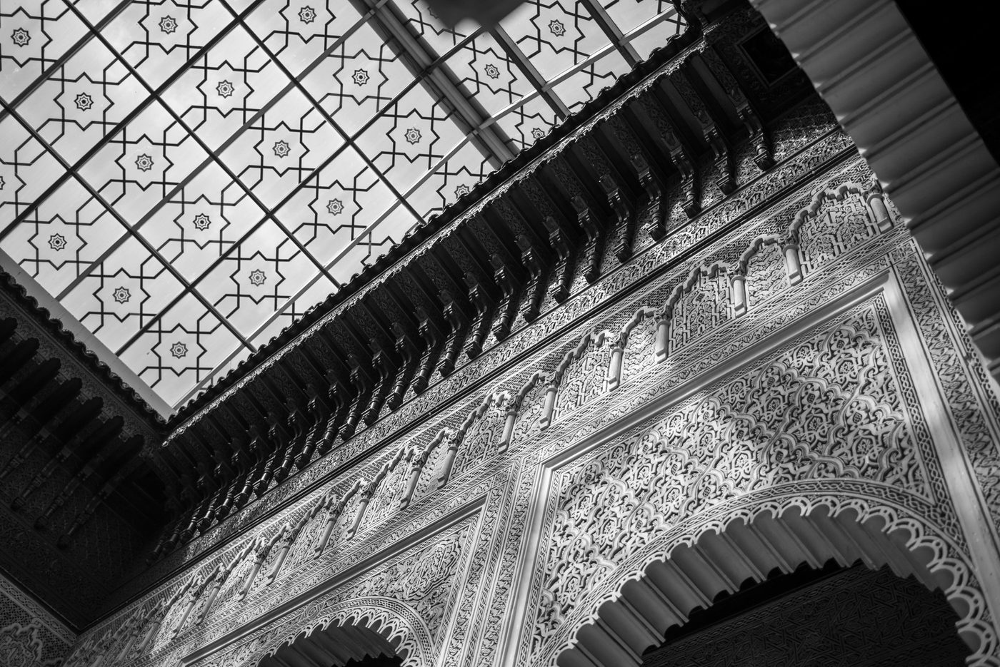 Star-shaped skylight lighting a richly carved cornice, Casablanca