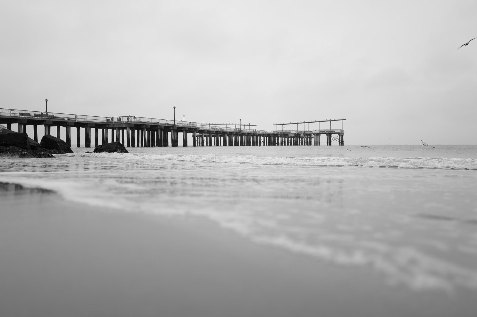 Long pier stretching into the sea, Coney Island