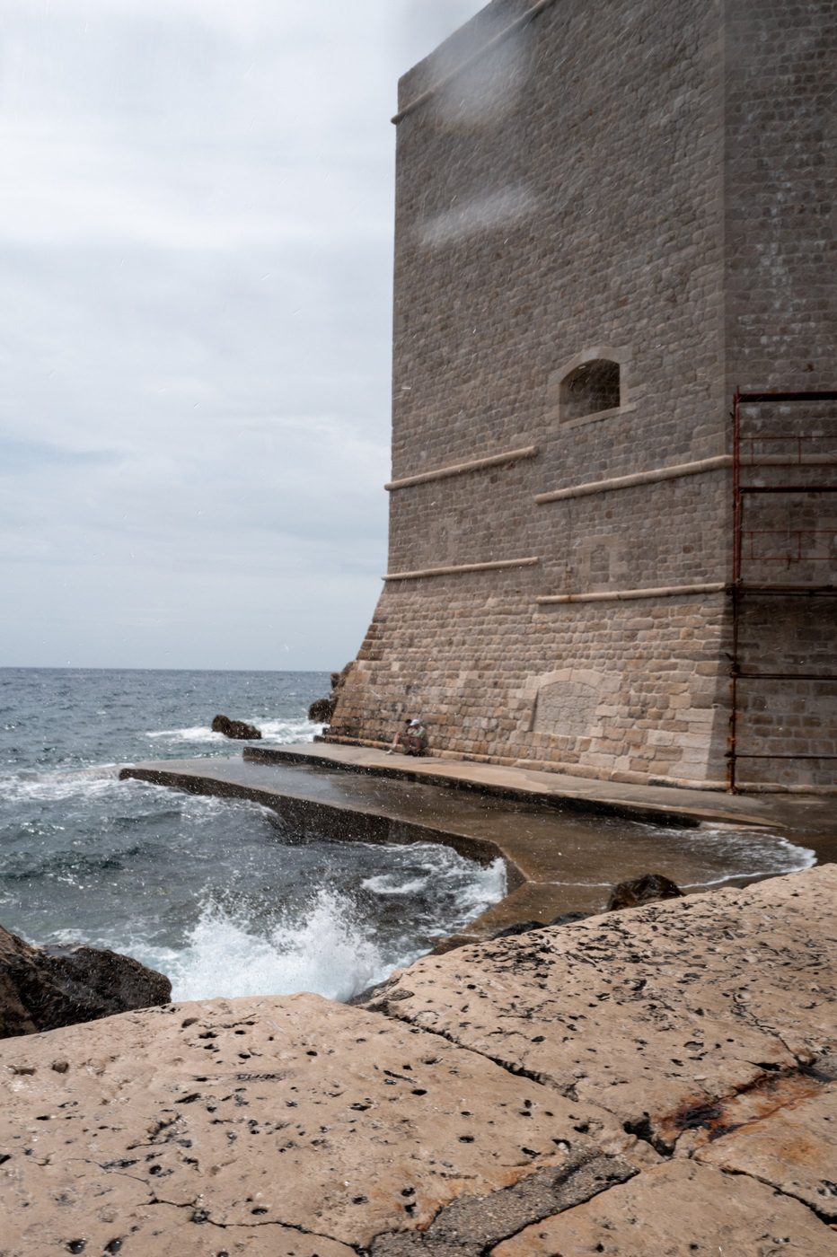 Waves breaking at the foot of the fortified ramparts, Dubrovnik