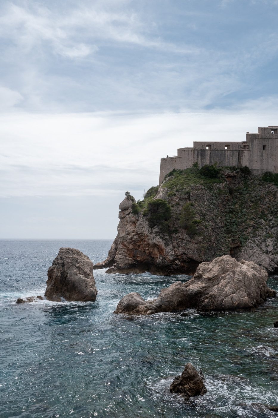 Rocks rising from the sea at the foot of Lovrijenac fortress, Dubrovnik