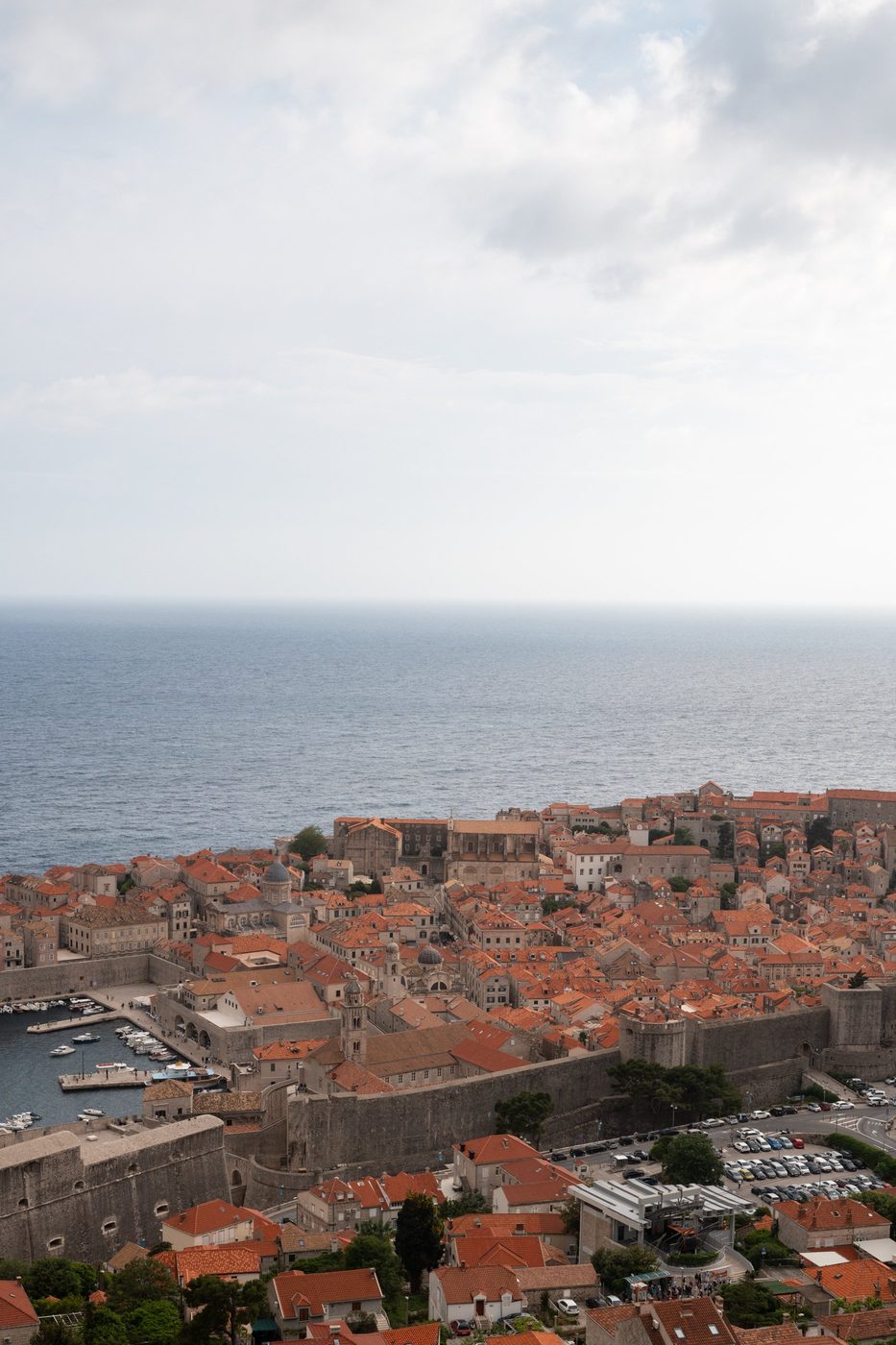 Panorama of the orange rooftops of the old town enclosed by the ramparts, Dubrovnik