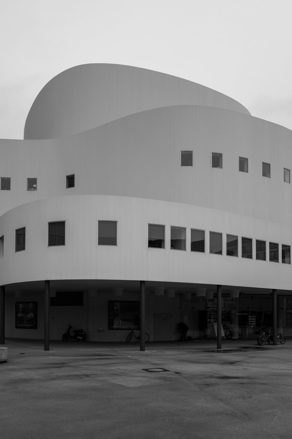 Modern building with white curves and asymmetrical windows, Düsseldorf
