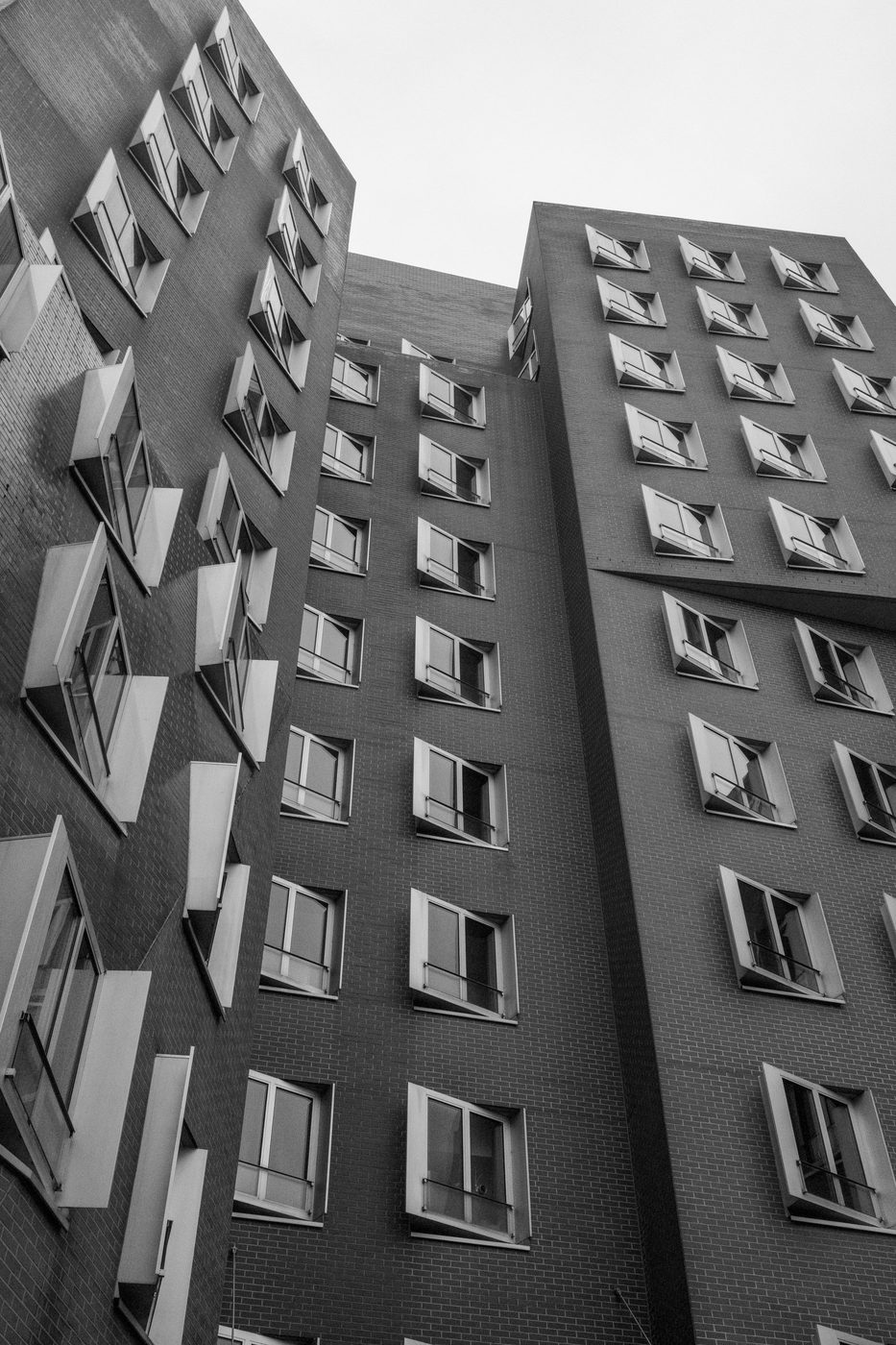 Brick facade with projecting windows seen from below, Düsseldorf