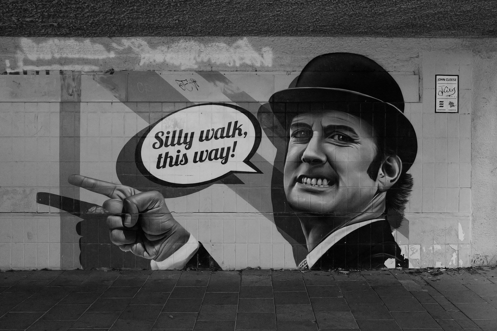 Fresque d'un homme en chapeau melon, bulle 