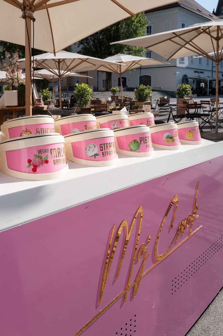Colorful tubs of artisanal ice cream on a street stand, Ljubljana