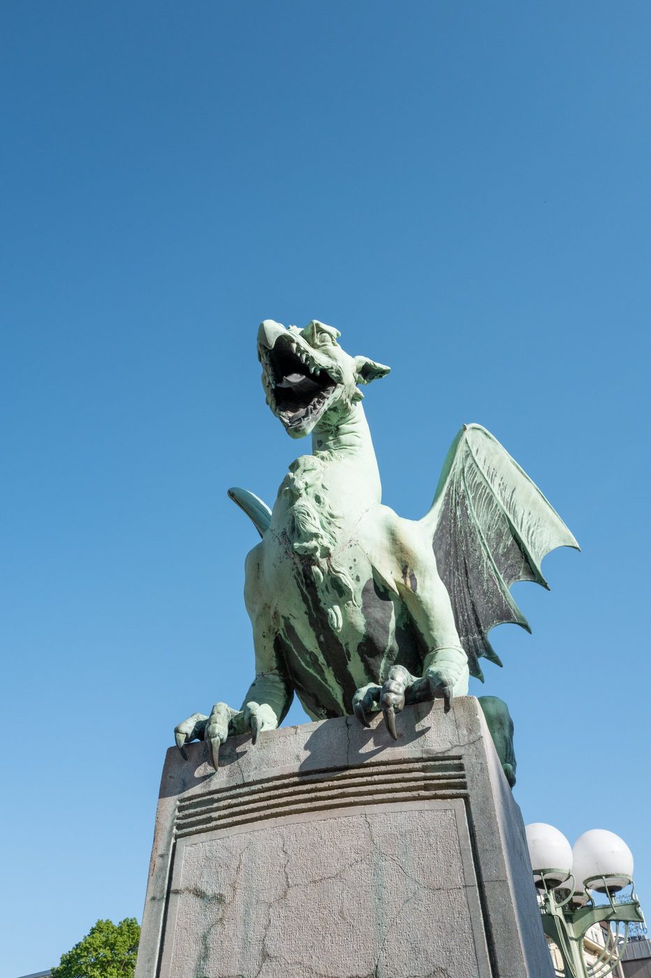 Weathered bronze dragon watching over the bridge, Ljubljana
