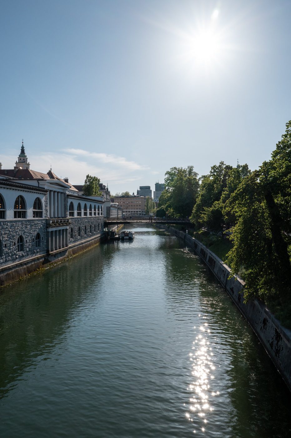 Sun sparkling on the canal near the market hall, Ljubljana