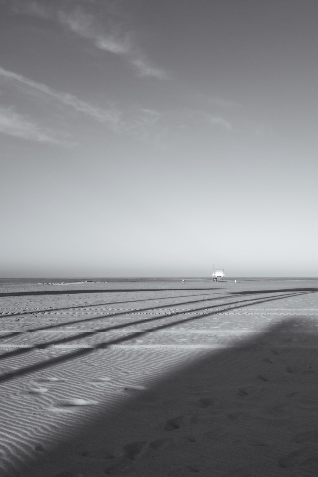 Long shadows on the sand at sunrise, Los Angeles