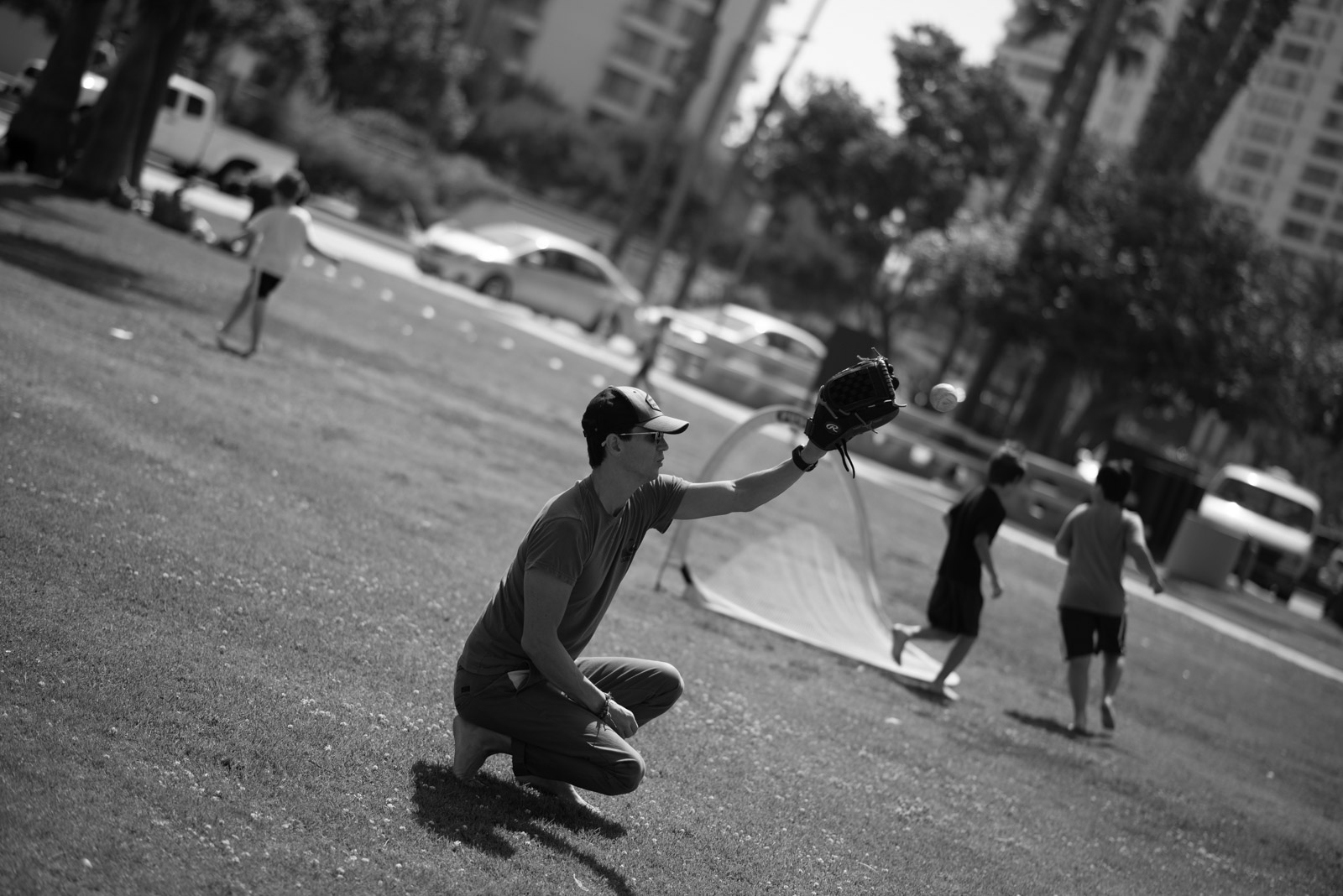 Man flying a kite in a park, Los Angeles