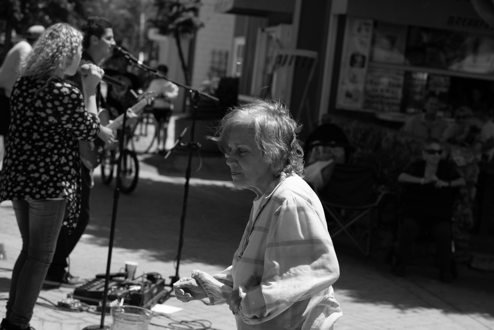 Street musicians setting up their equipment, Los Angeles