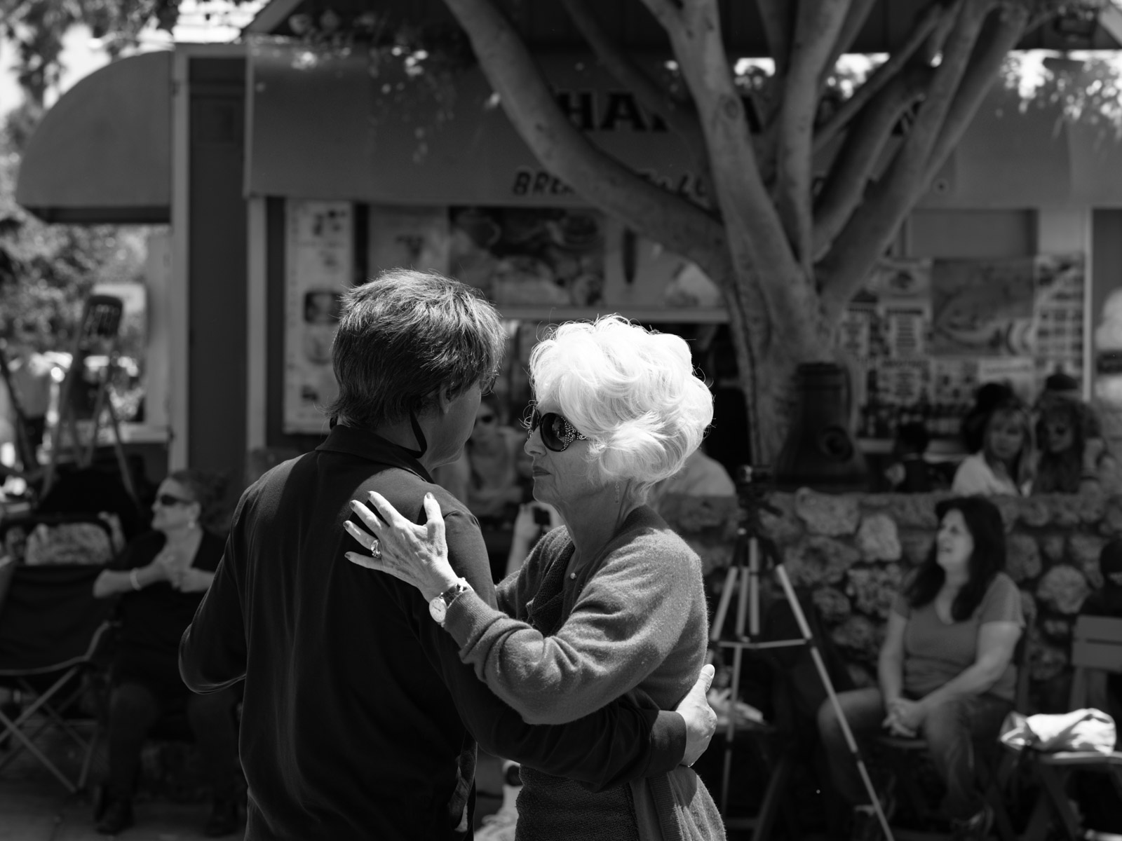 Elderly couple dancing outdoors, Los Angeles