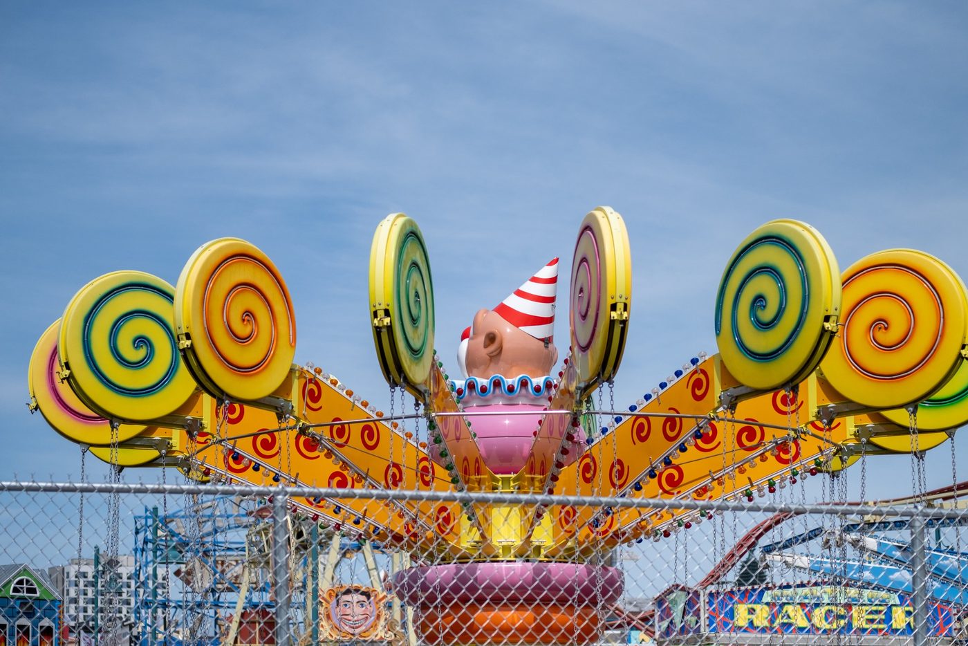 Carousel shaped like giant lollipops under the Coney Island sky, New York