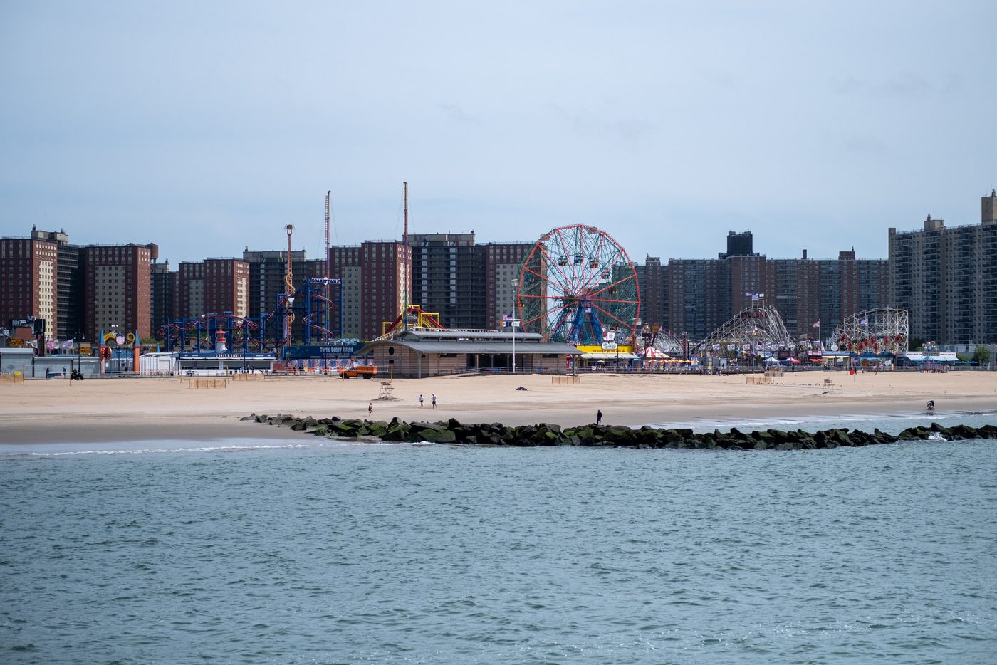 View from the sea of the Ferris wheel and buildings of Coney Island, New York