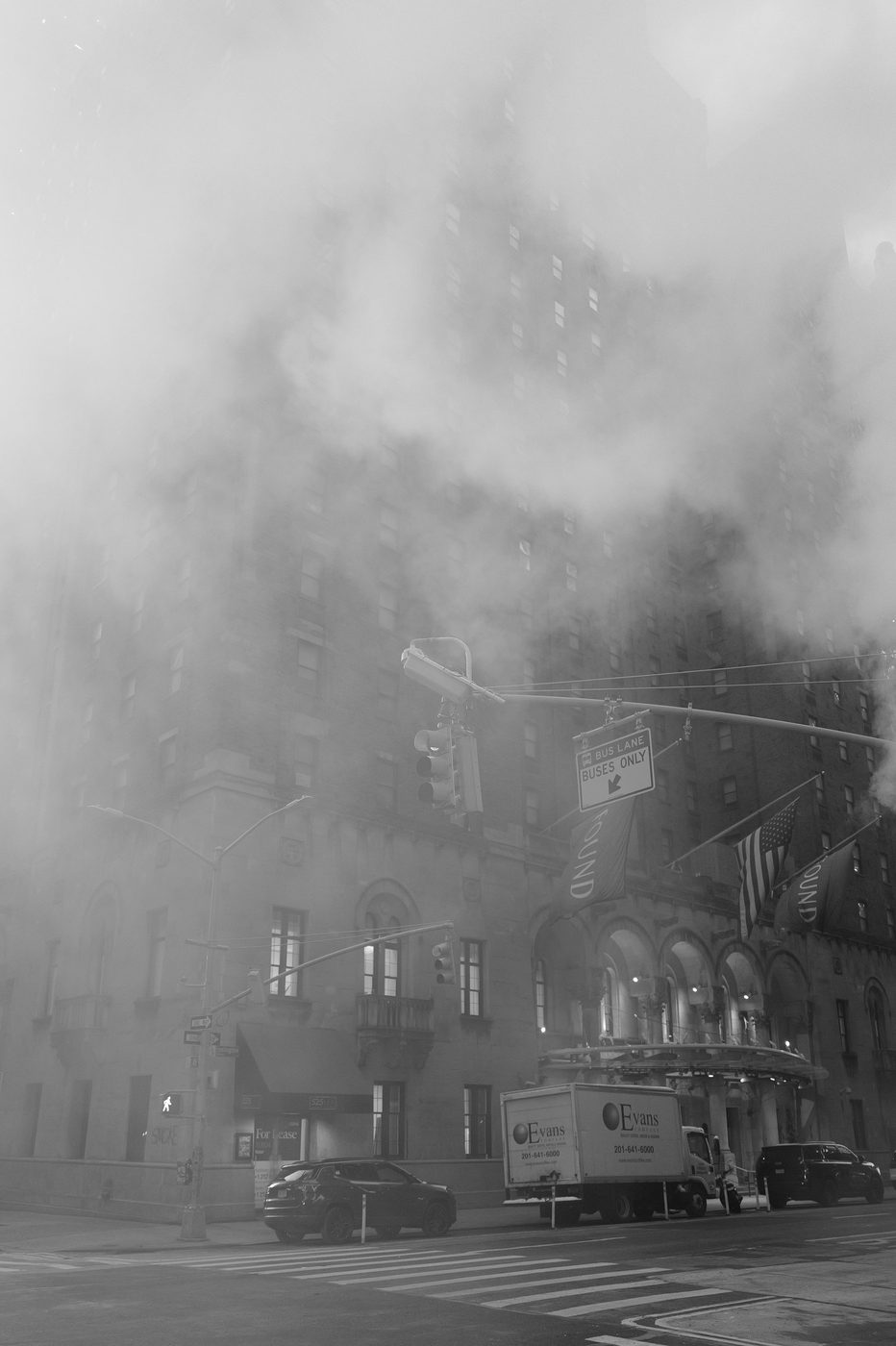 Hotel facade wrapped in a thick cloud of steam, New York