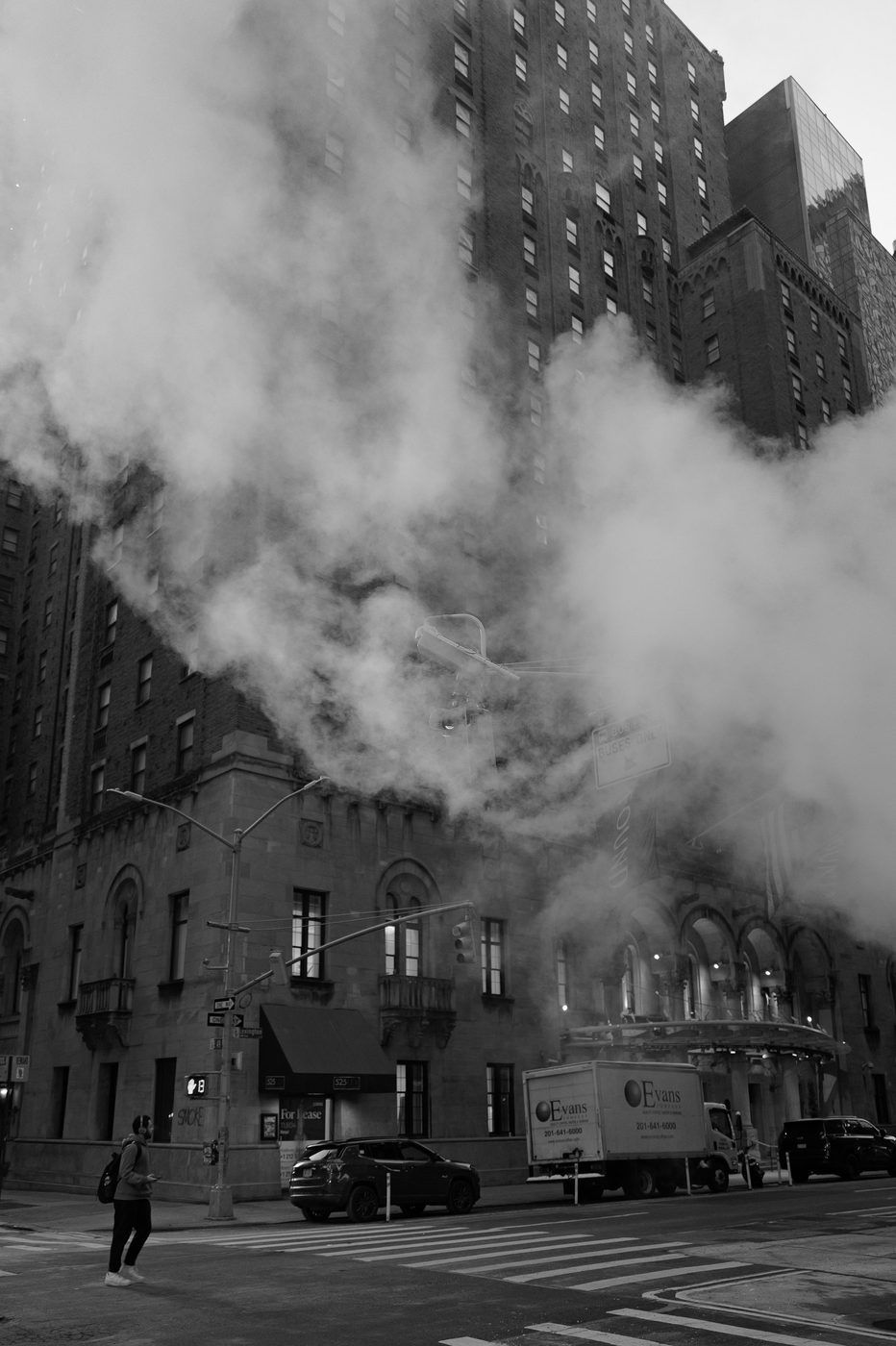 Construction smoke masking the stone facade of a hotel, New York
