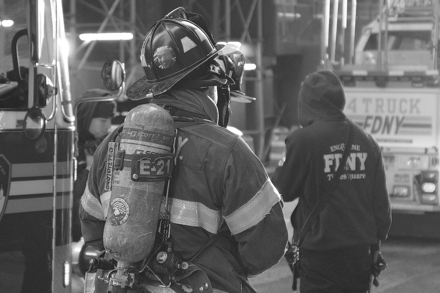 FDNY firefighter seen from behind with his oxygen tank, New York