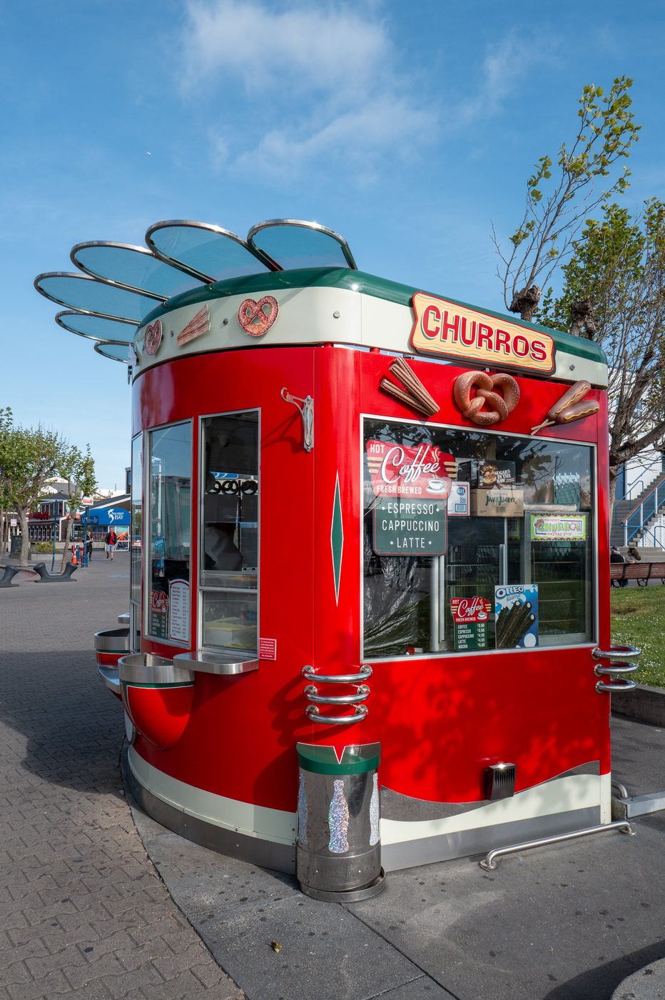 Bright red churro kiosk decorated with pretzels and hot dogs, San Francisco