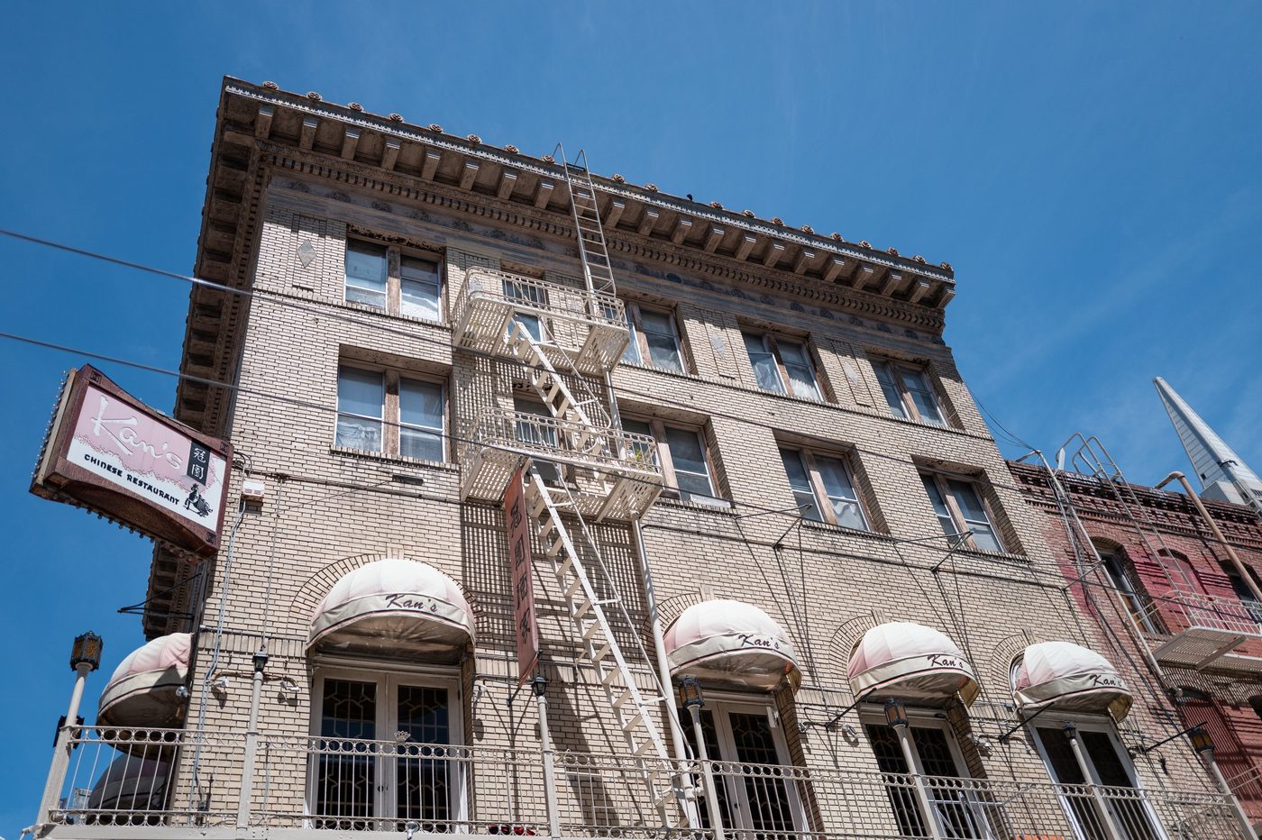 Fire escape unfolded on the façade of the Kan's Chinese restaurant, San Francisco