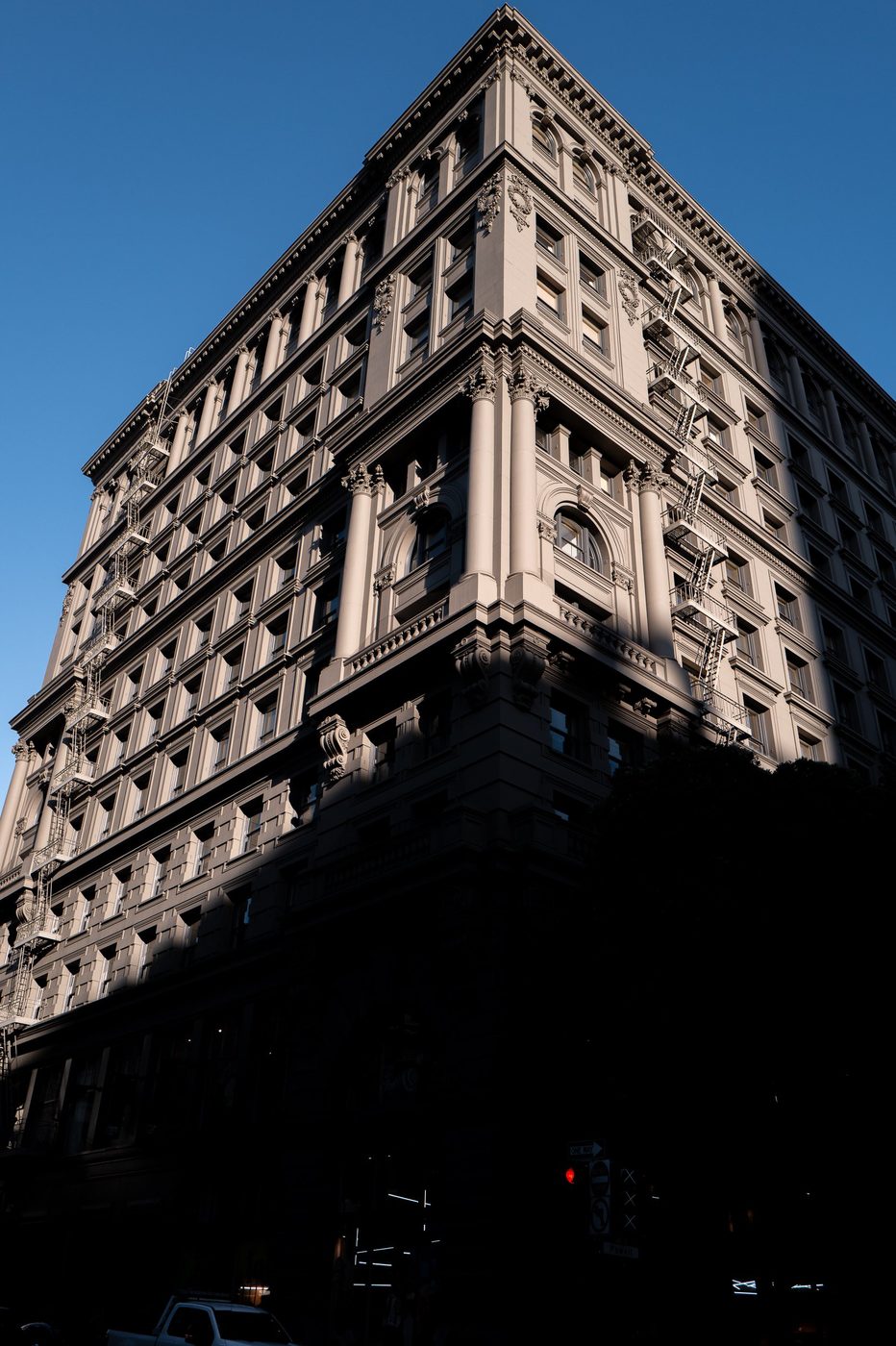 Contrast of shadow and light on the ornate façade of an old building, San Francisco