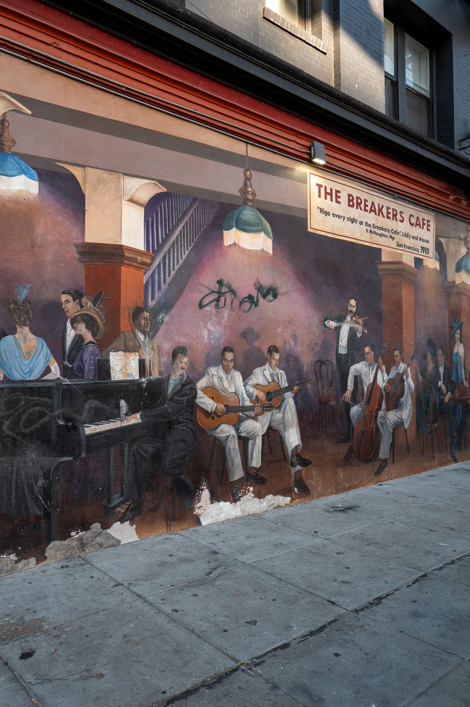 Mural evoking a vintage jazz orchestra in front of The Breakers Cafe, San Francisco