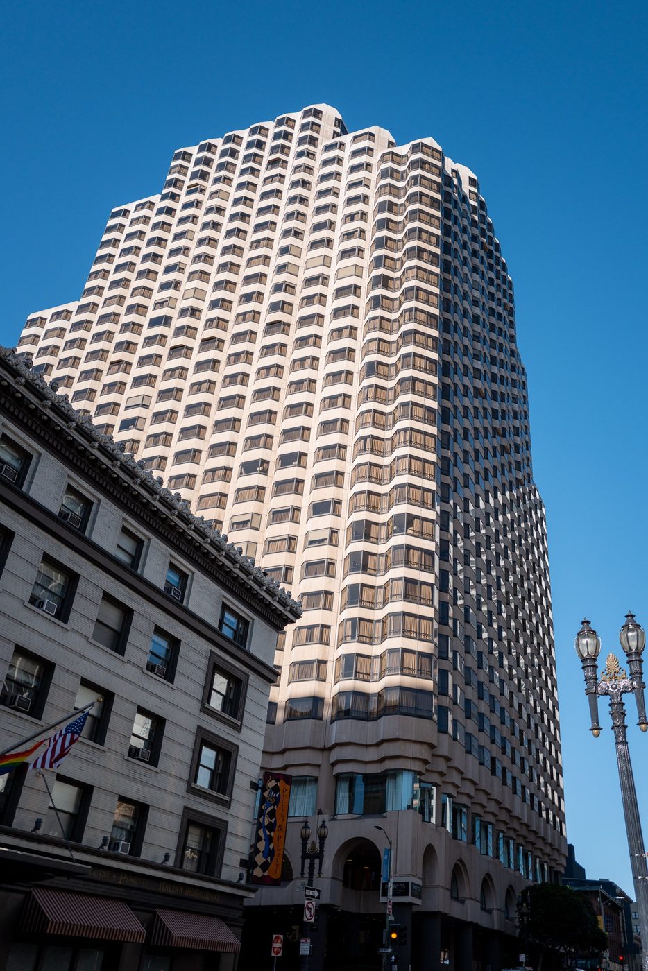 Hotel Parc 55 tower seen in low-angle view under a blue sky, San Francisco