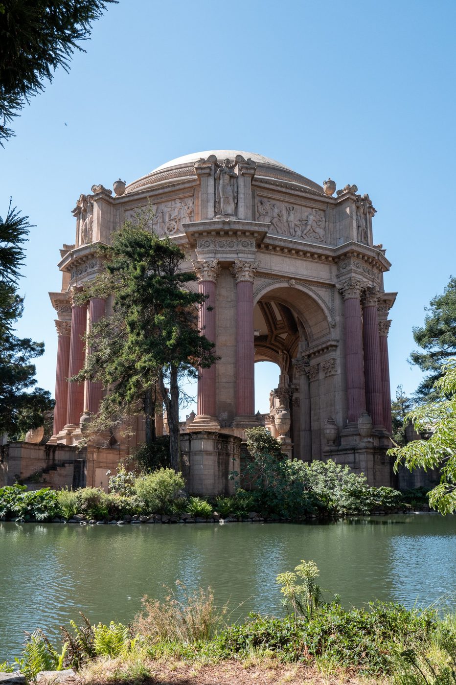 Neoclassical rotunda of the Palace of Fine Arts reflected in the lagoon, San Francisco