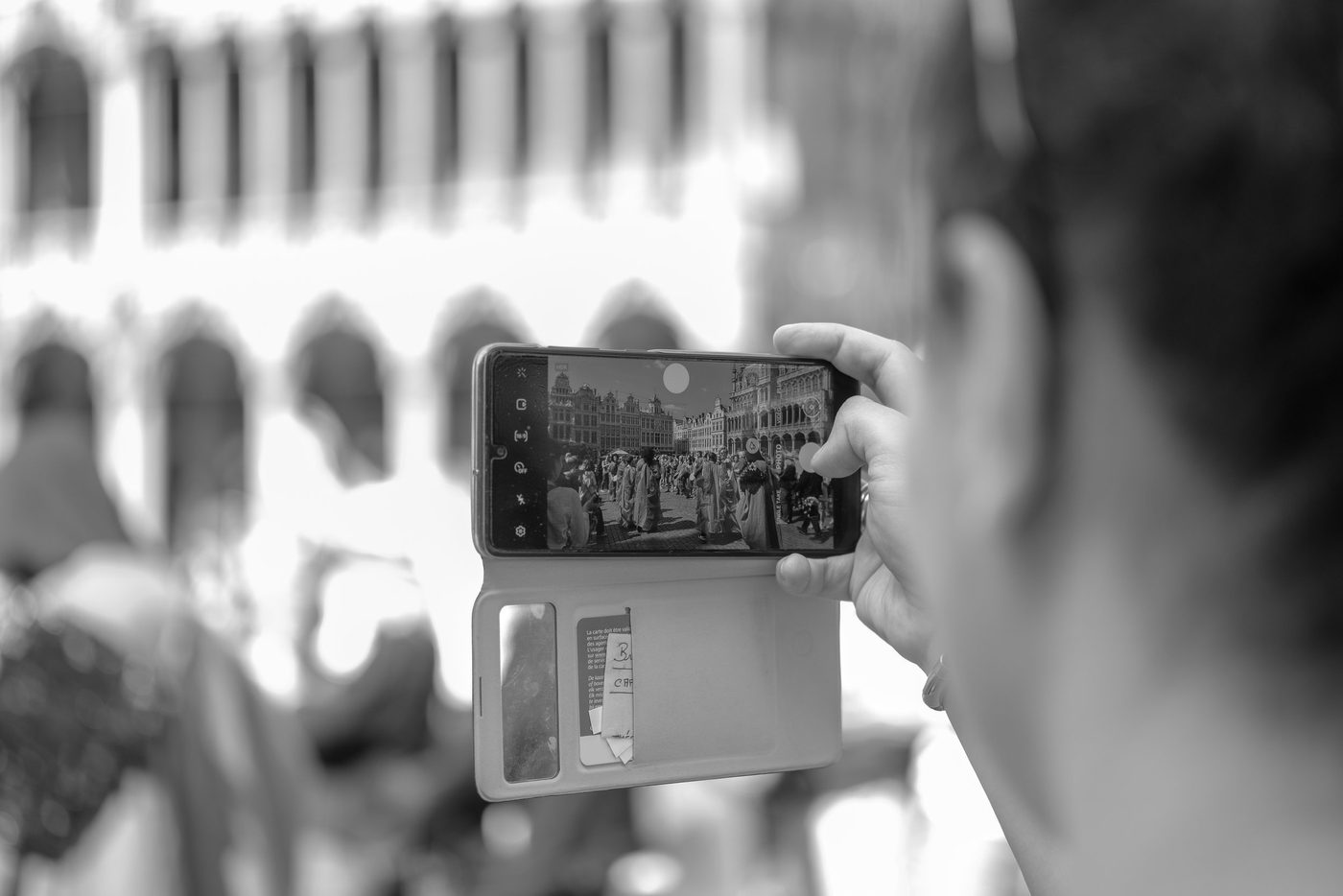 Photographer in action at the Zinneke Parade, Brussels (plate 006)