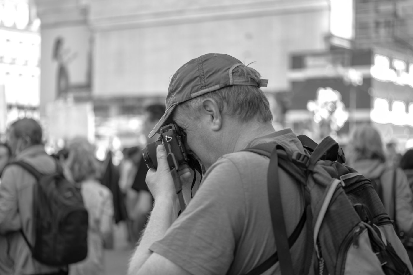 Photographer in action at the Zinneke Parade, Brussels (plate 012)