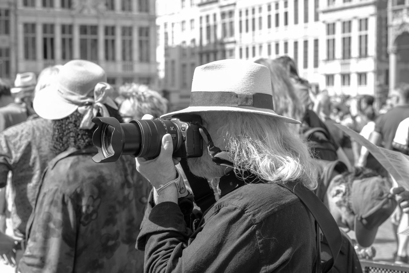 Photographer in action at the Zinneke Parade, Brussels (plate 013)