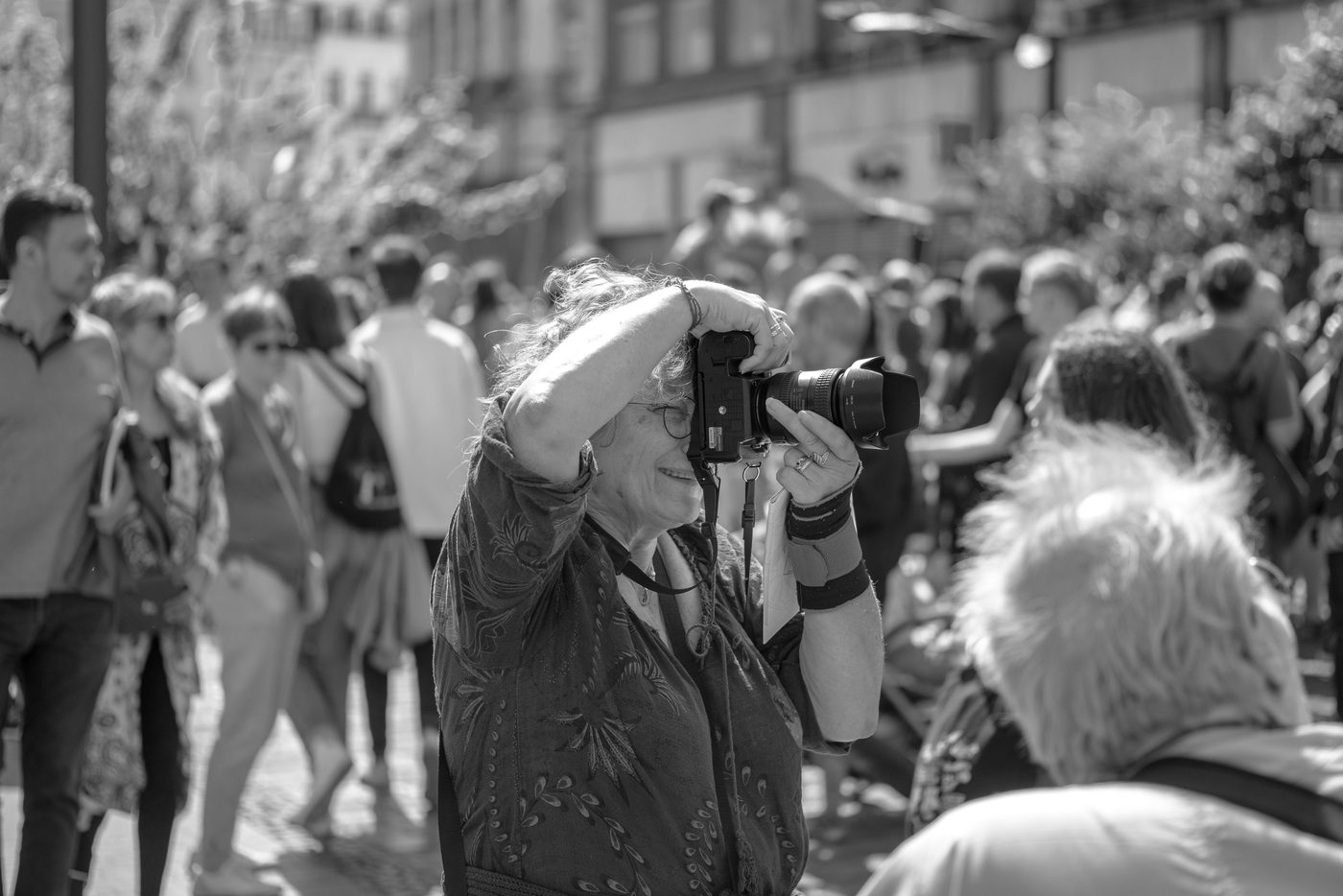 Photographer in action at the Zinneke Parade, Brussels (plate 014)
