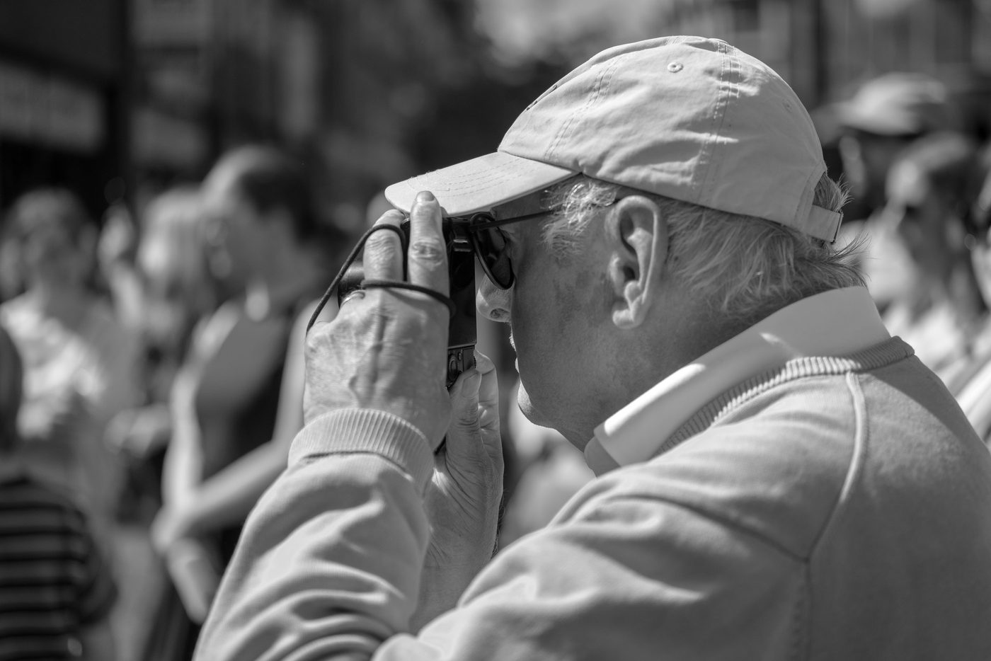 Photographer in action at the Zinneke Parade, Brussels (plate 018)