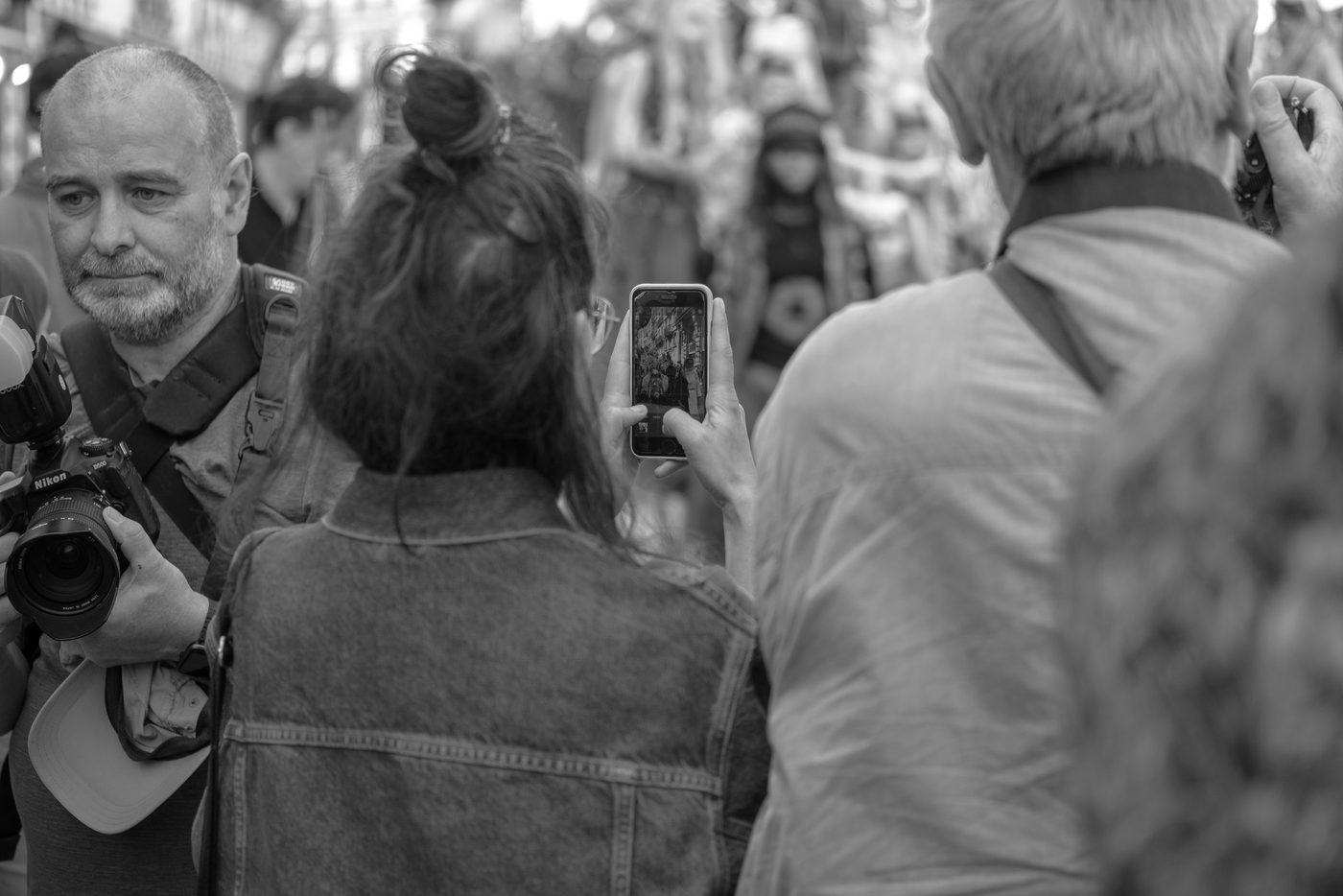 Photographer in action at the Zinneke Parade, Brussels (plate 019)