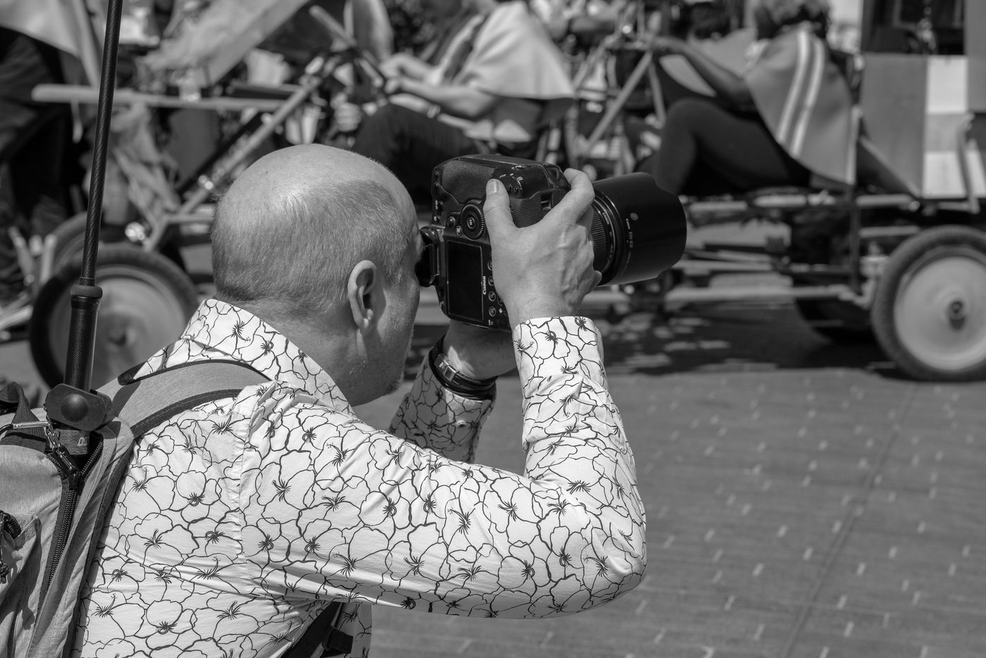 Photographer in action at the Zinneke Parade, Brussels (plate 028)