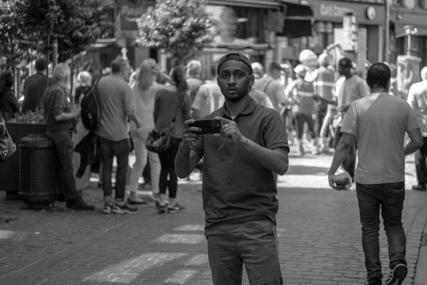 Photographer in action at the Zinneke Parade, Brussels (plate 038)