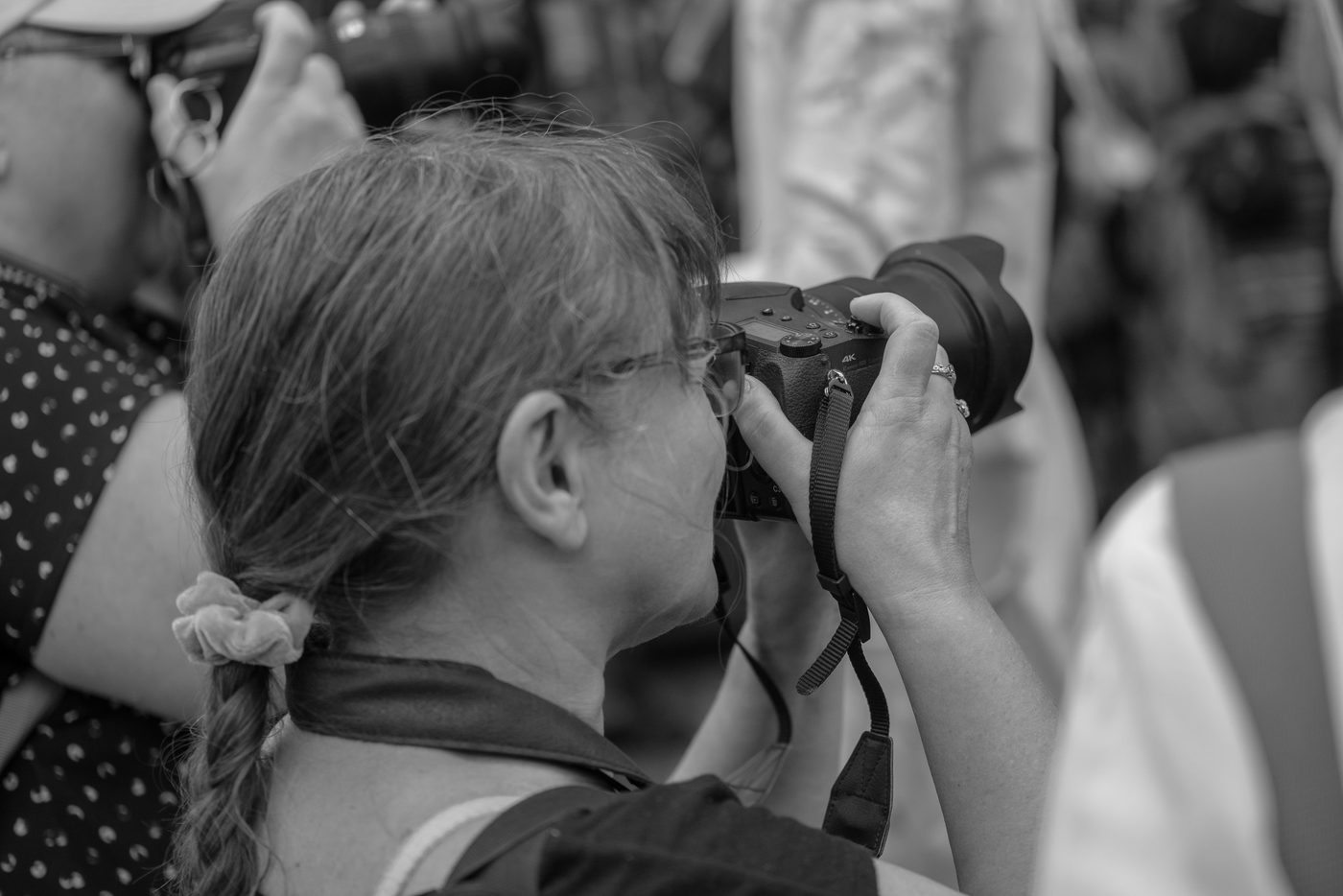 Photographer in action at the Zinneke Parade, Brussels (plate 040)