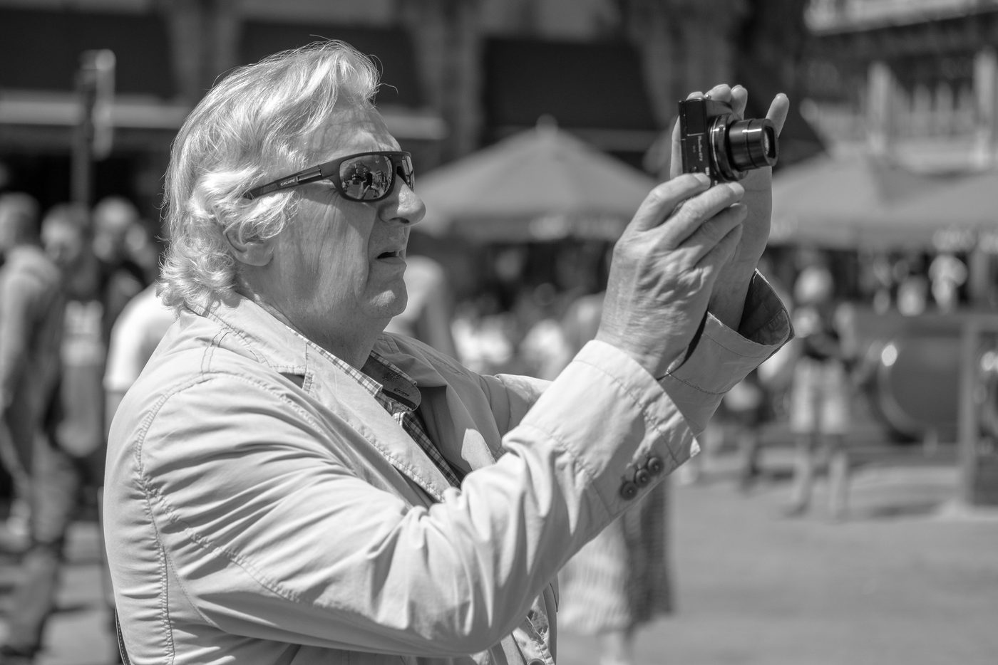 Photographer in action at the Zinneke Parade, Brussels (plate 043)