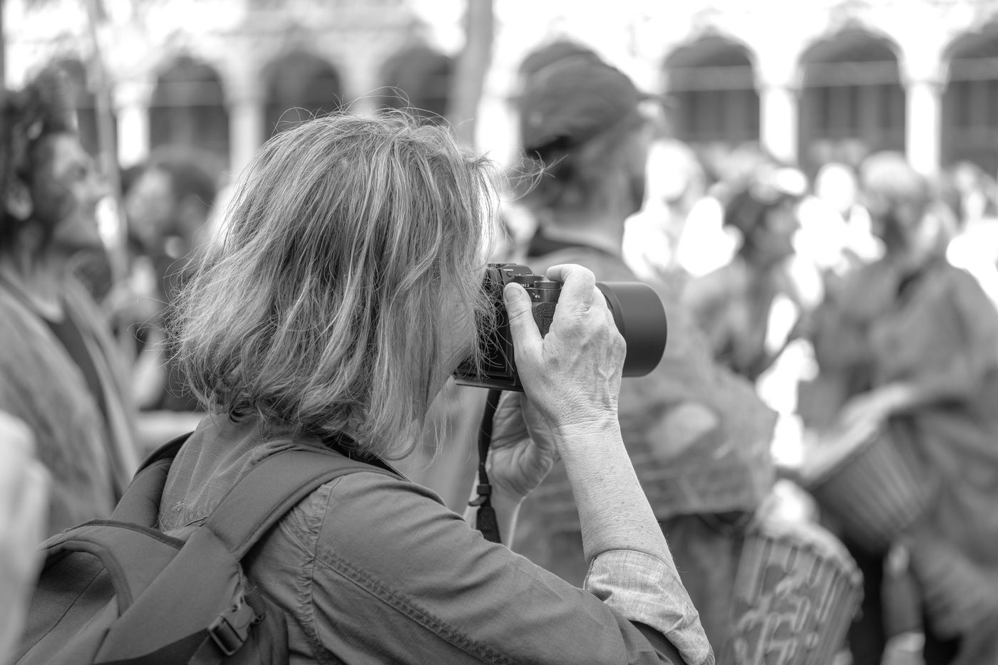 Photographer in action at the Zinneke Parade, Brussels (plate 044)