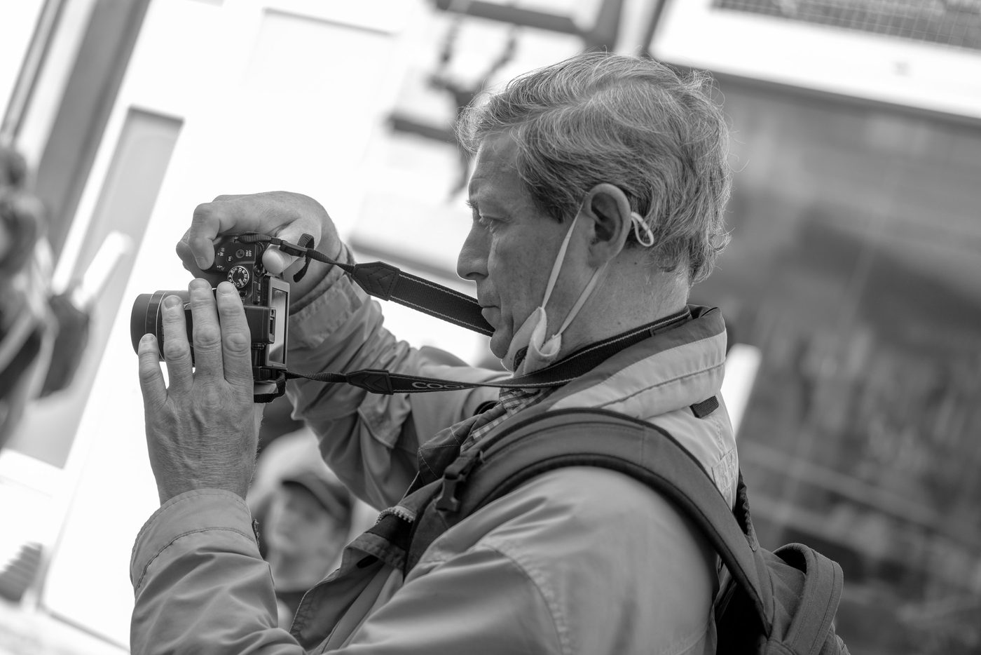 Photographer in action at the Zinneke Parade, Brussels (plate 045)