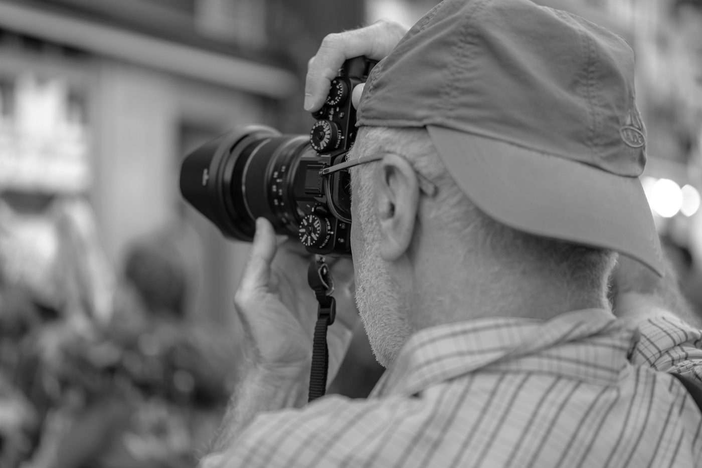Photographer in action at the Zinneke Parade, Brussels (plate 046)