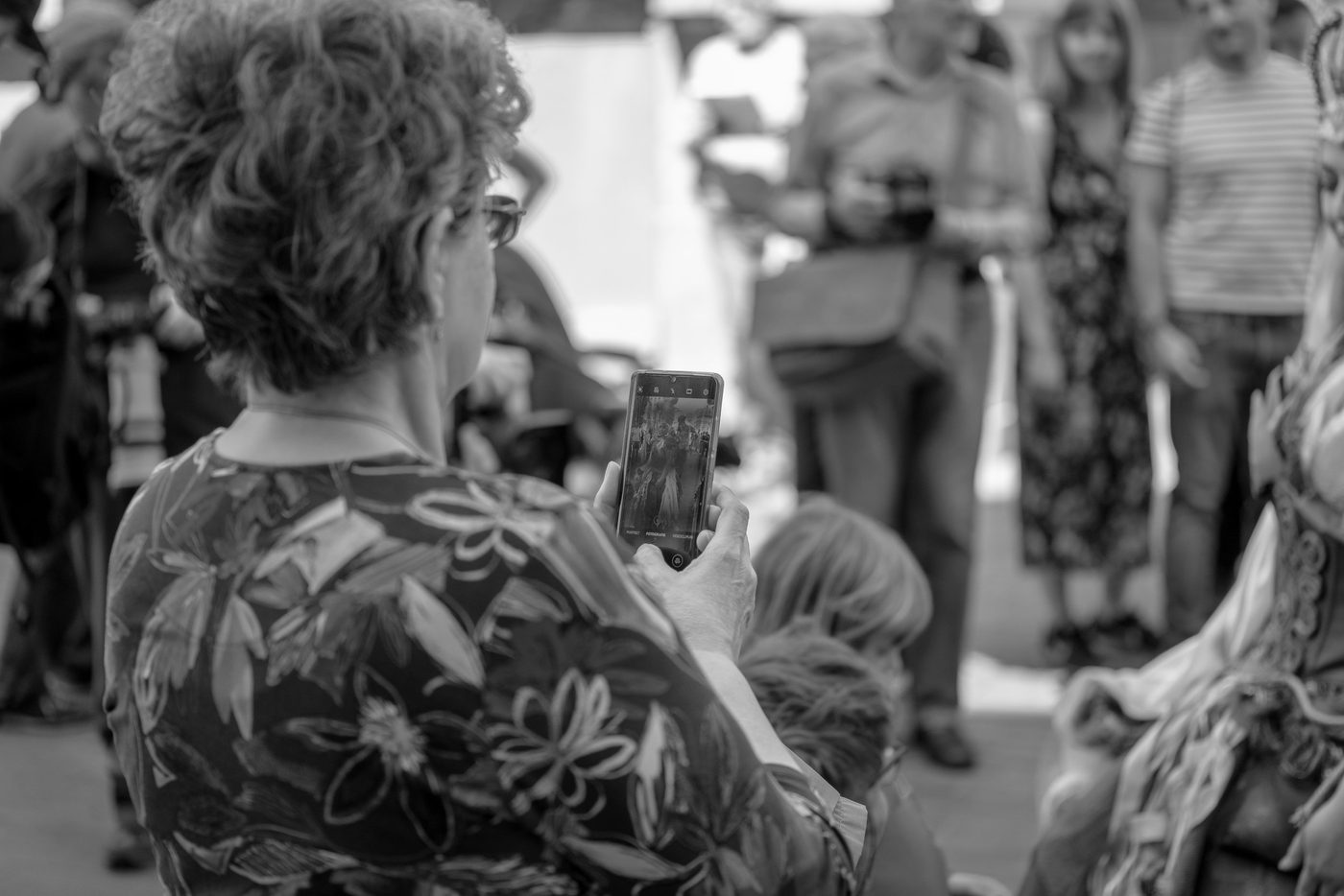 Photographer in action at the Zinneke Parade, Brussels (plate 048)