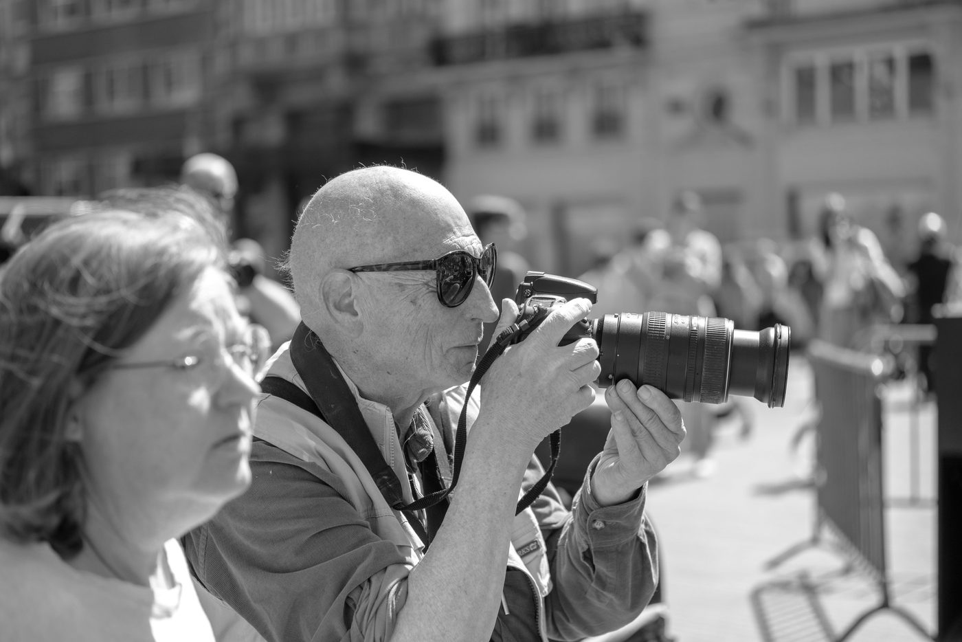 Photographer in action at the Zinneke Parade, Brussels (plate 049)
